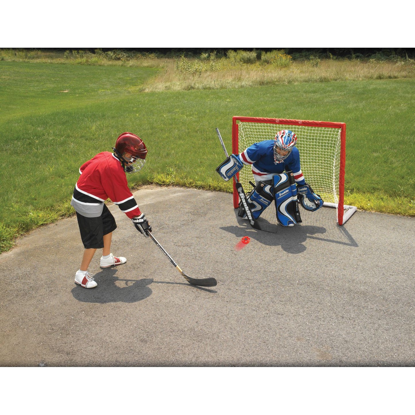 Franklin Sports NHL Pro Commander Puck Red