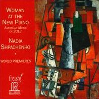 WOMAN AT THE NEW PIANO