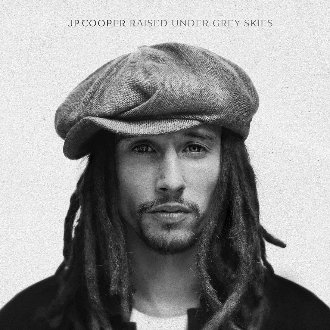 Raised Under Grey Skies [Deluxe Edition]