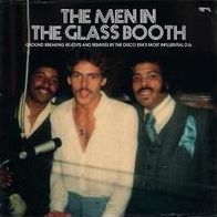 The Men In The Glass Booth