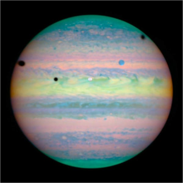 Hubble Telescope Archives -Hubble Spots Rare Triple Eclipse on Jupiter