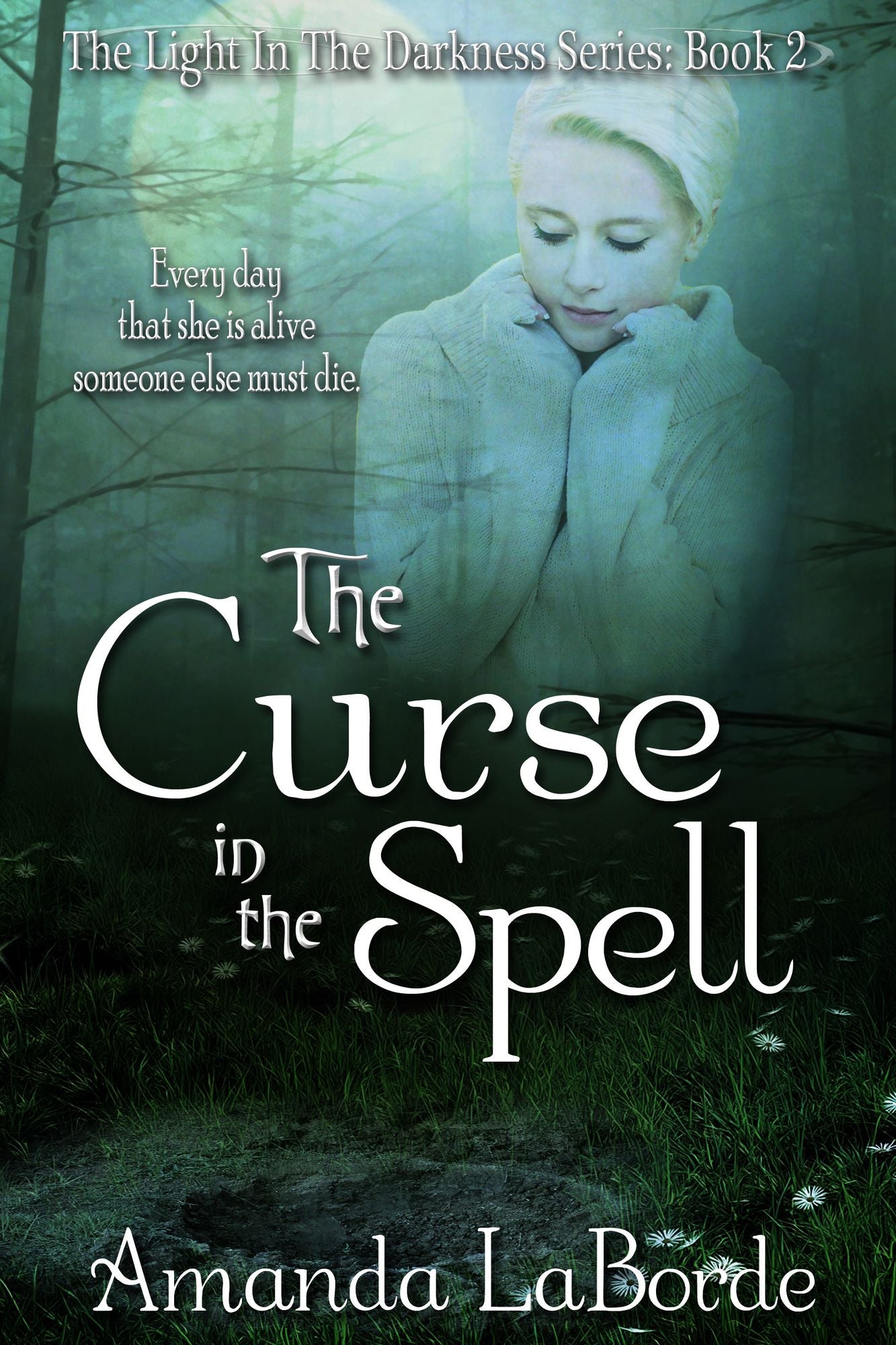The Light in The Darkness Book 2: The Curse in The Spell