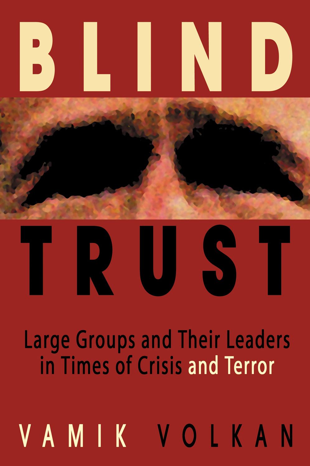 Blind Trust: Large Groups and Their Leaders in Times of Crisis and Terror