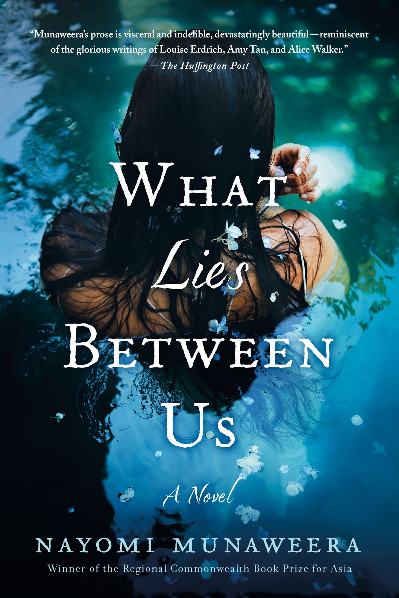 What Lies Between Us: A Novel