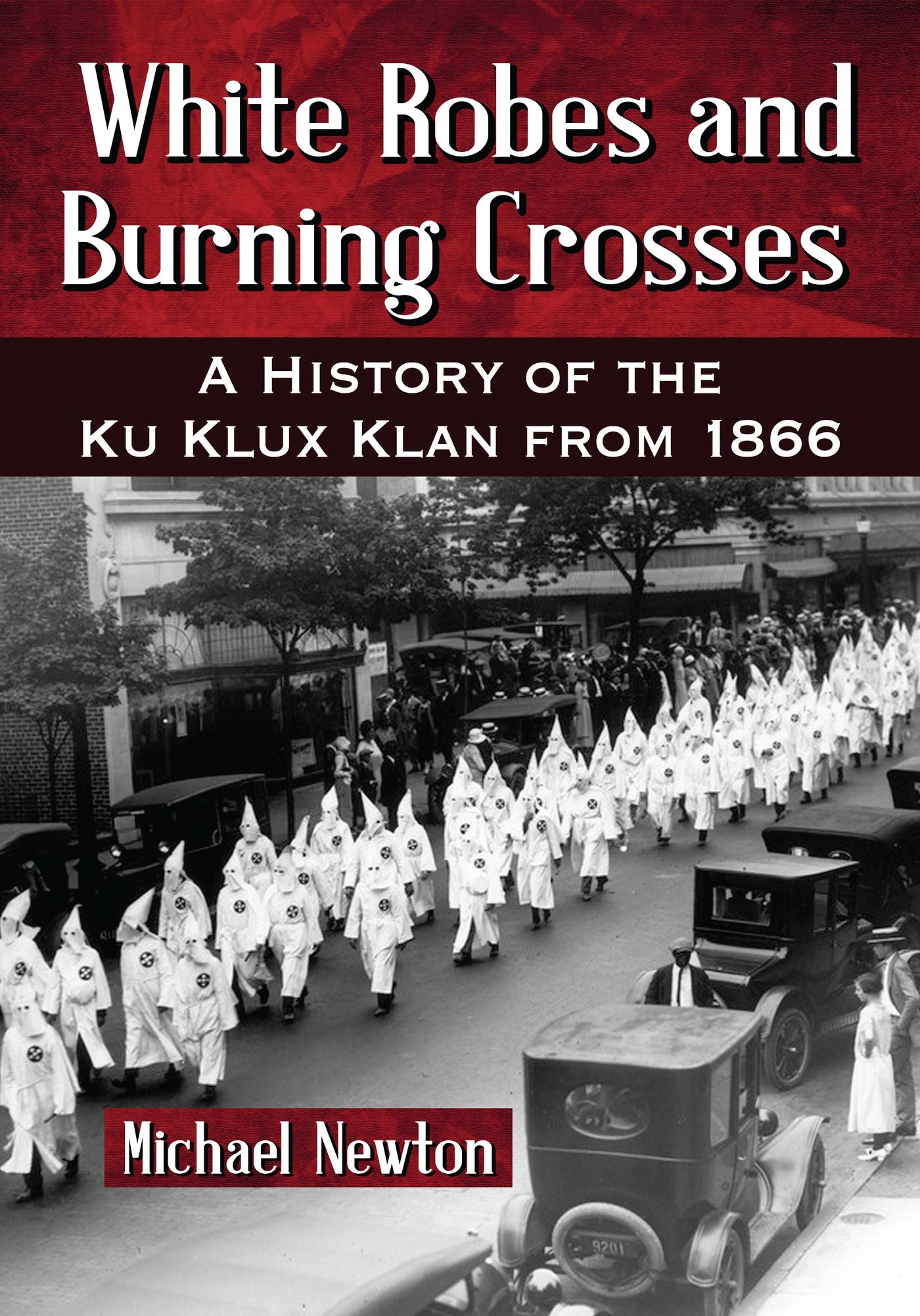White Robes and Burning Crosses: A History of the Ku Klux Klan from 1866