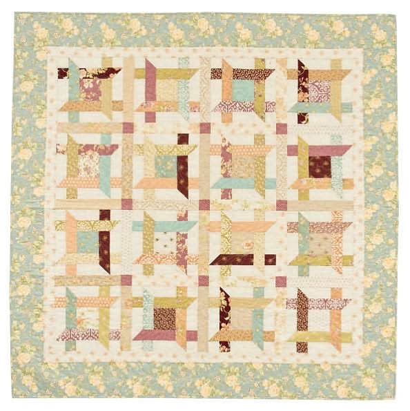 A Baker's Dozen: 13 Quilts from Jelly Rolls, Layer Cakes, and More From the Staff at That Patchwork Place
