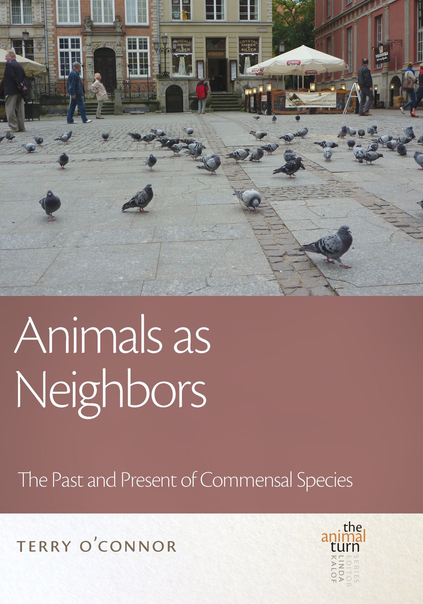 Animals as Neighbors: The Past and Present of Commensal Animals