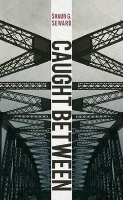 Caught Between. Shaun G. Seward
