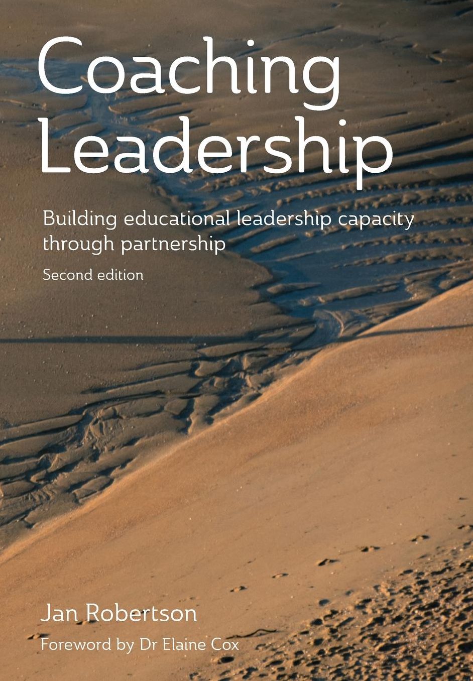Coaching leadership: Building educational leadership capacity through partnership